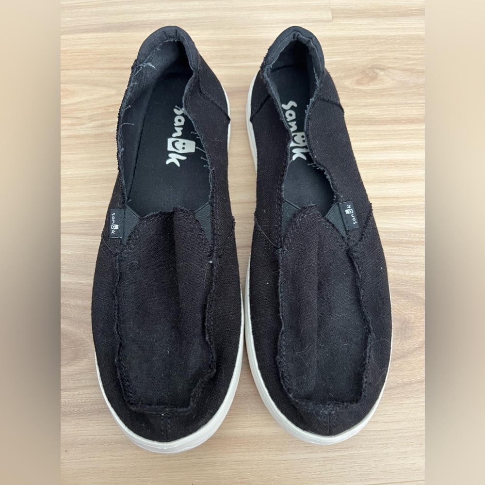 Sanuk women’s black slip on shoes